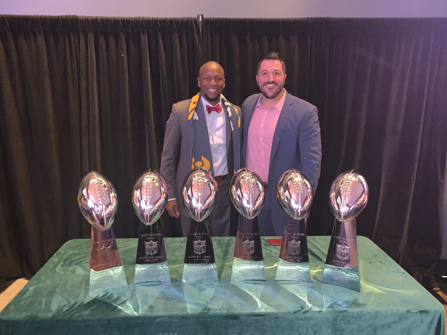 LeRoy Watkins with the Patriots super bowl trophies